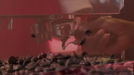 animation of pouring coffee beans with hands of barista preparing coffee at a cafe