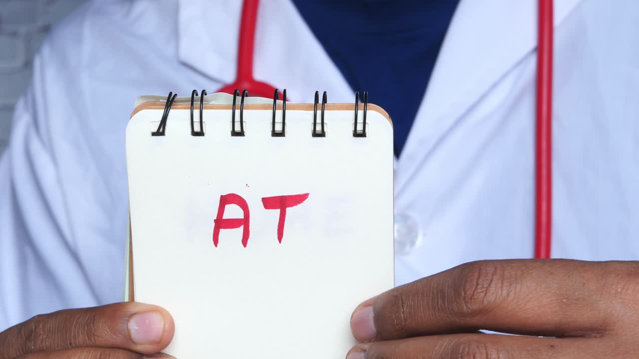 Doctor holding notepad with handwritten notes