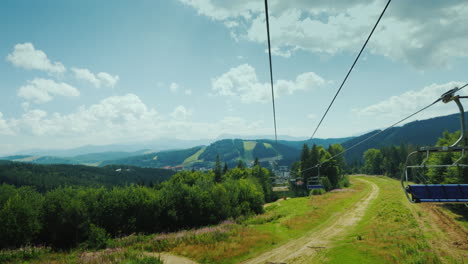 go on a ski lift in the summer first-person view