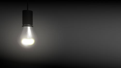 4k video of light bulb on grey background. concept of electricity.