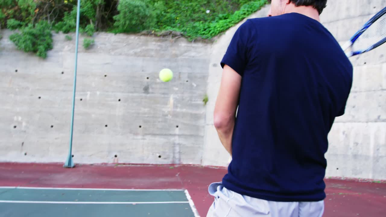 Active man playing tennis