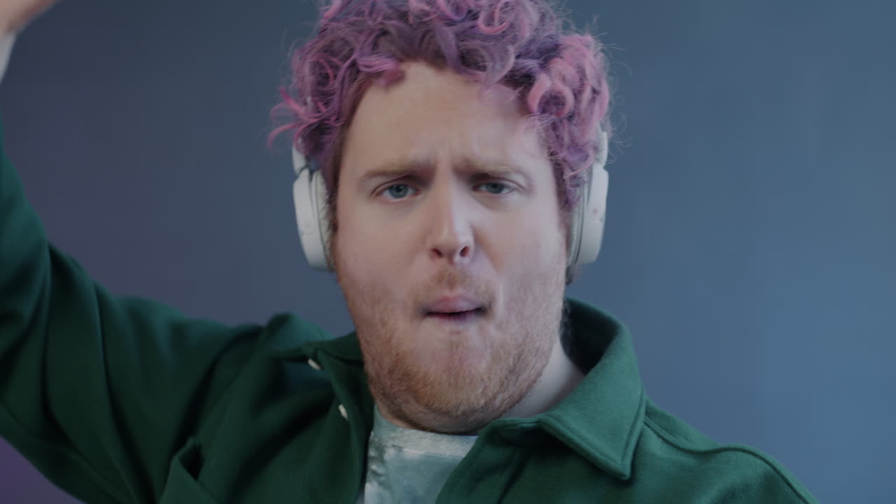 Man Listening to Music and Singing