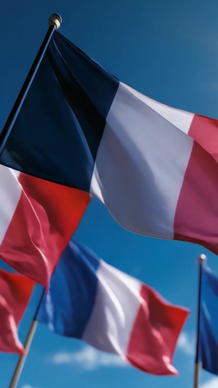 A Beautiful Display of French Flags Waving in the Breeze Under a Clear Blue Sky, Symbolizing National Pride and Unity