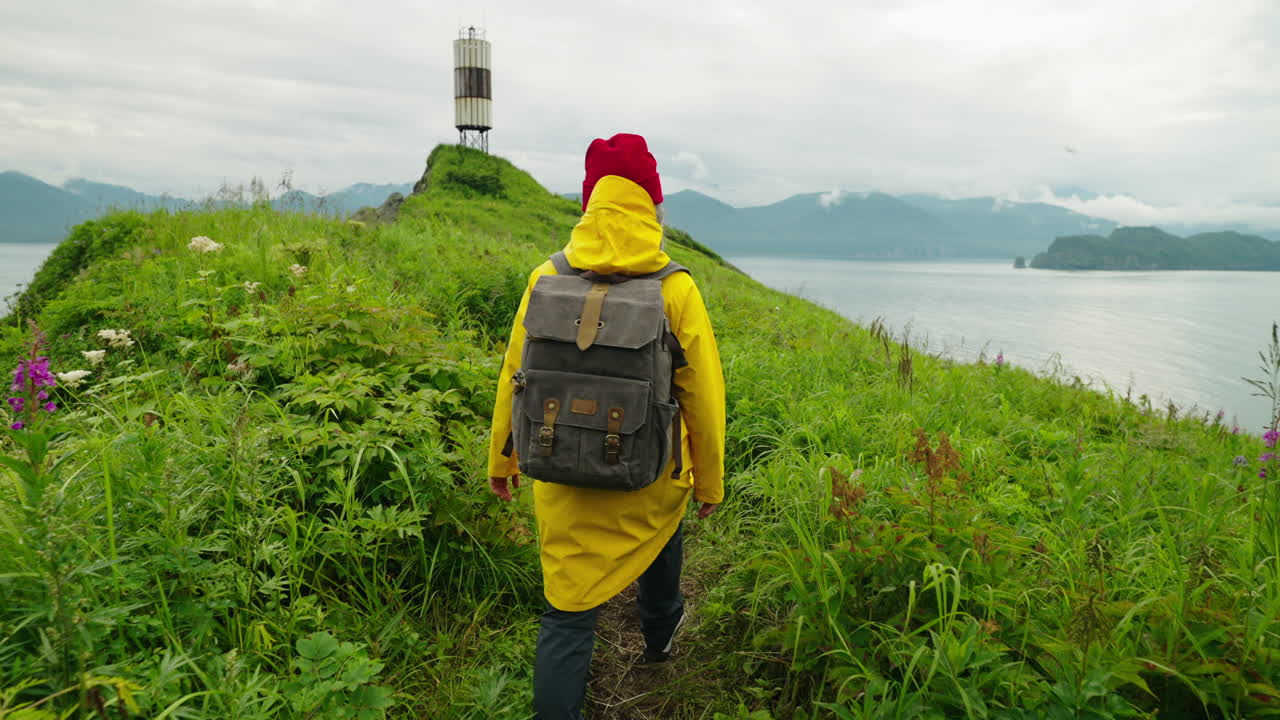 Woman Hiking on a Coastal Island Trail