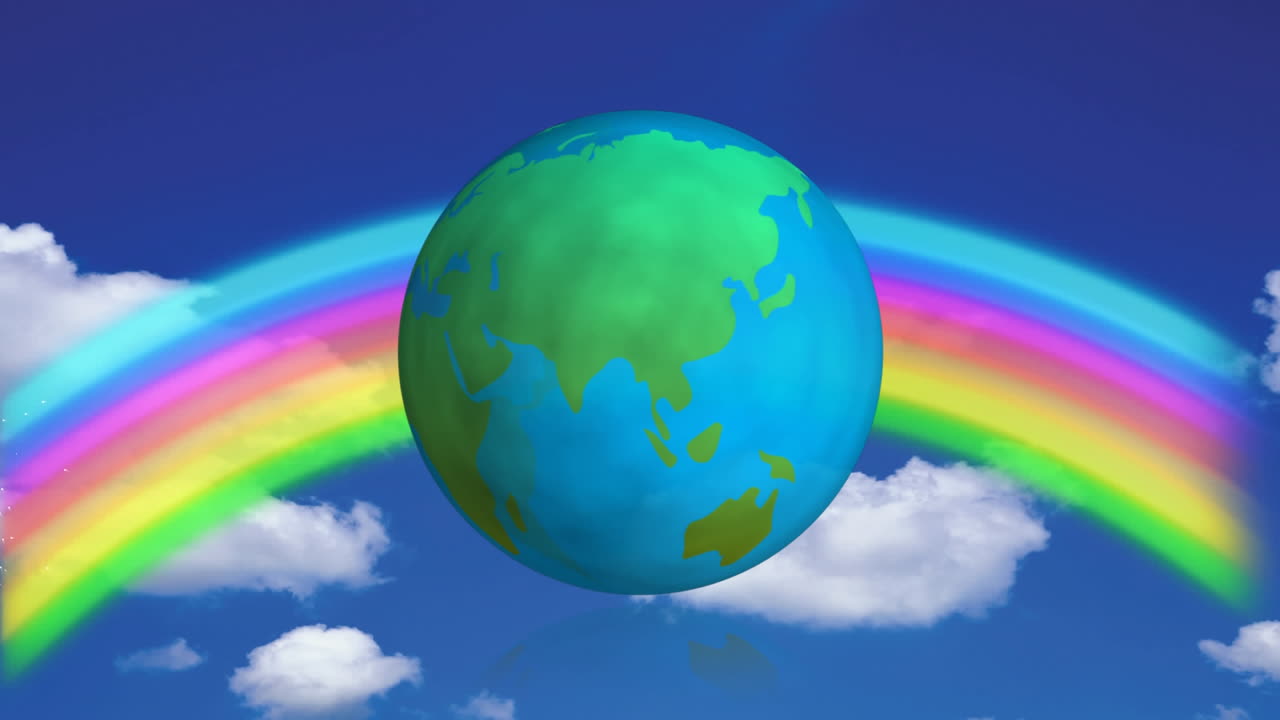 girando el globo terrestre contra un cielo azul con un arco iris