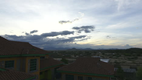 timelapse of clouds in evening moving in small kenya, africa town