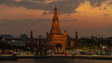 wat arun temple at sunset in bangkok