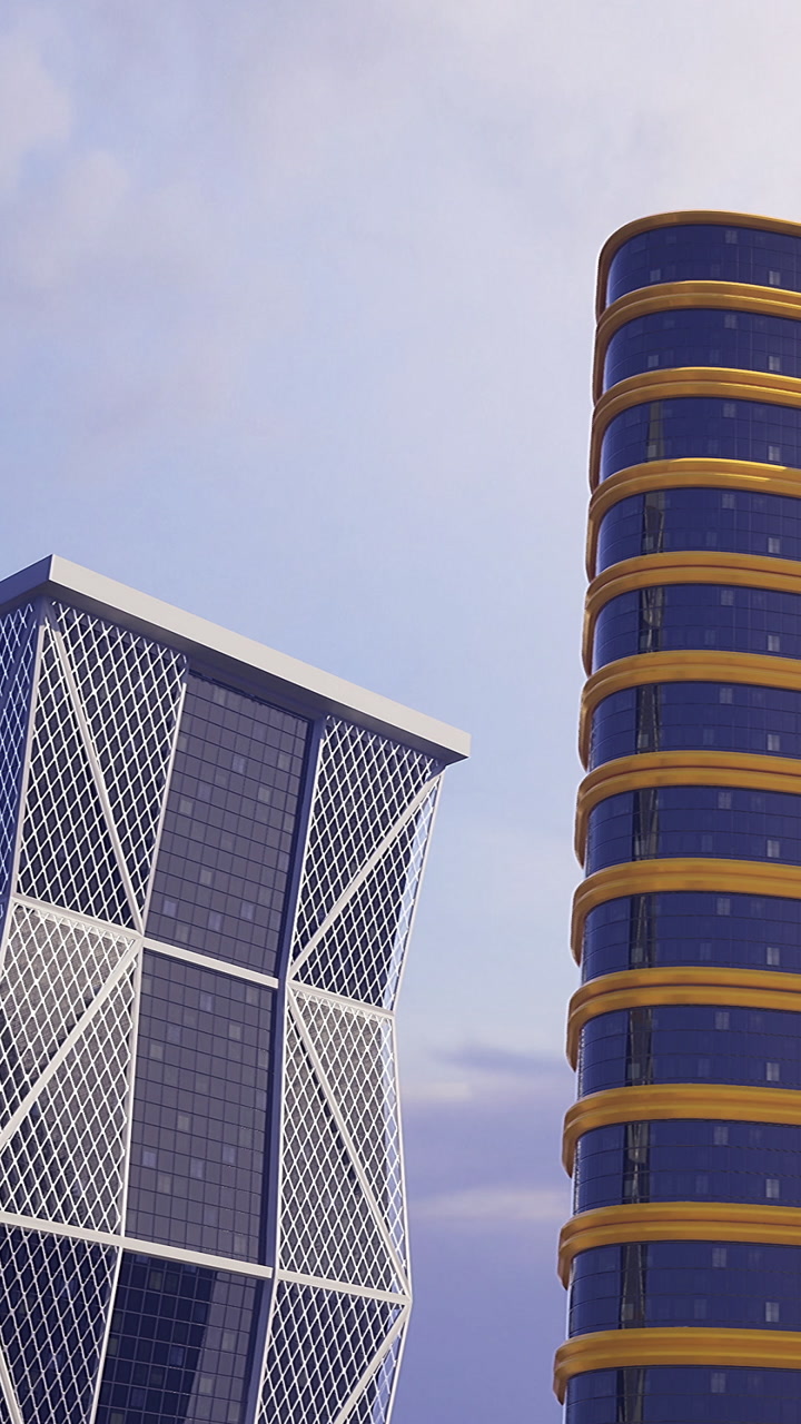 Modern buildings stand tall in a city skyline with blue sky above