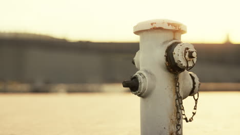 old hydrant on a seaside promenade