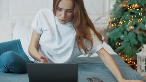 aggressive business woman getting sad news on laptop computer.