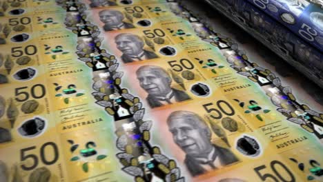 billetes de dinero en dólares australianos que imprimen en bucle sin costuras