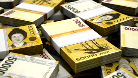 una pila de nuevos won surcoreanos