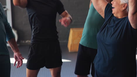 diverse seniors engaging in group fitness class