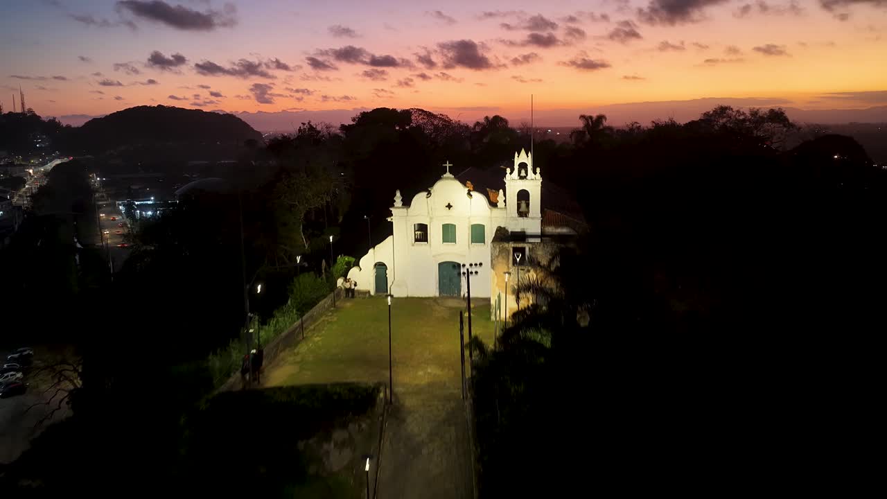 Illuminated Convent At Itanhaem In Sao Paulo Brazil. Religious Scene. Downtown Cityscape. Illuminated City. Illuminated Convent At Itanhaem In Sao Paulo Brazil. Sunset Landscape