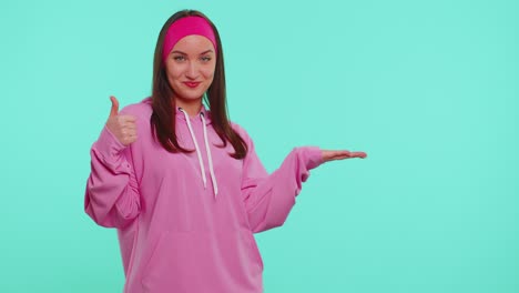 girl pointing empty place advertising area for commercial text copy space for goods promotion