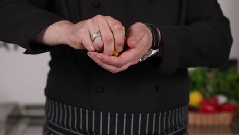 chef squeezing lemon