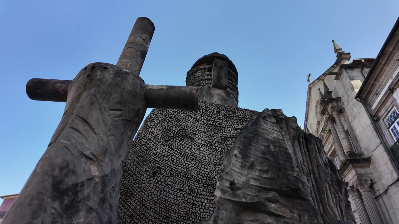 Guimaraes city monuments Dom Afonso henriques statue in the historical city center. Gimbal shot