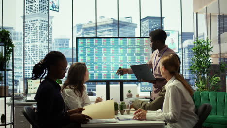 business associates collaborating at the conference table in boardroom