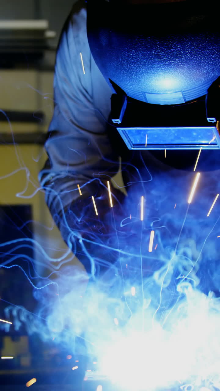 Welder welding a metal
