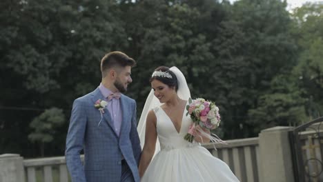 Groom-walking-with-bride.-Wedding-couple.-Happy-family.-Man-and-woman-in-love