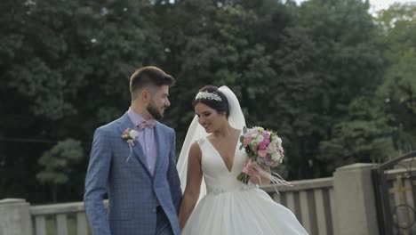 groom walking with bride. wedding couple. happy family. man and woman in love