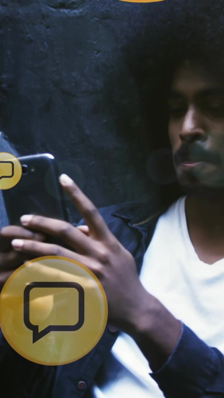 Multiple message icons floating against african american man using smartphone sitting on the stairs
