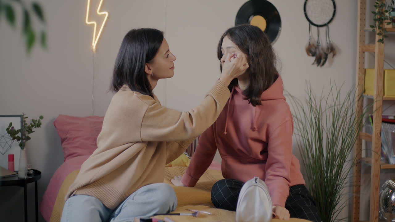 Mother and Daughter Applying Makeup