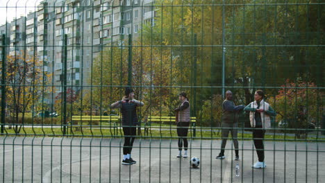 women stretching outdoors