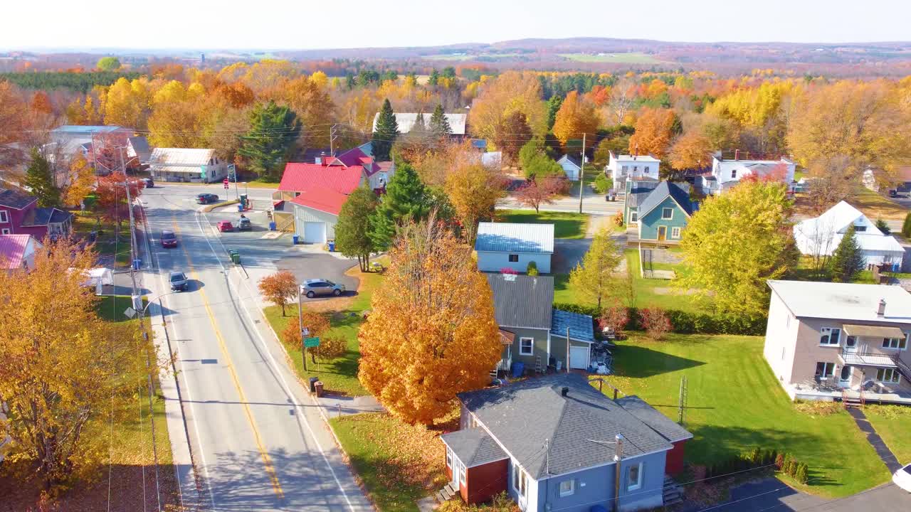 Autumn view with an explosion of color in its trees in the charming village of Estrie in Quebec