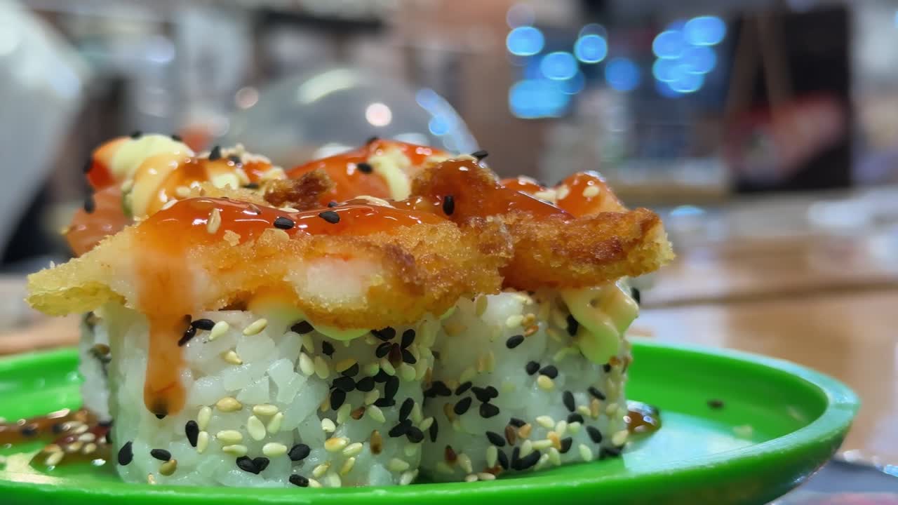 Sushi being served in a restaurant