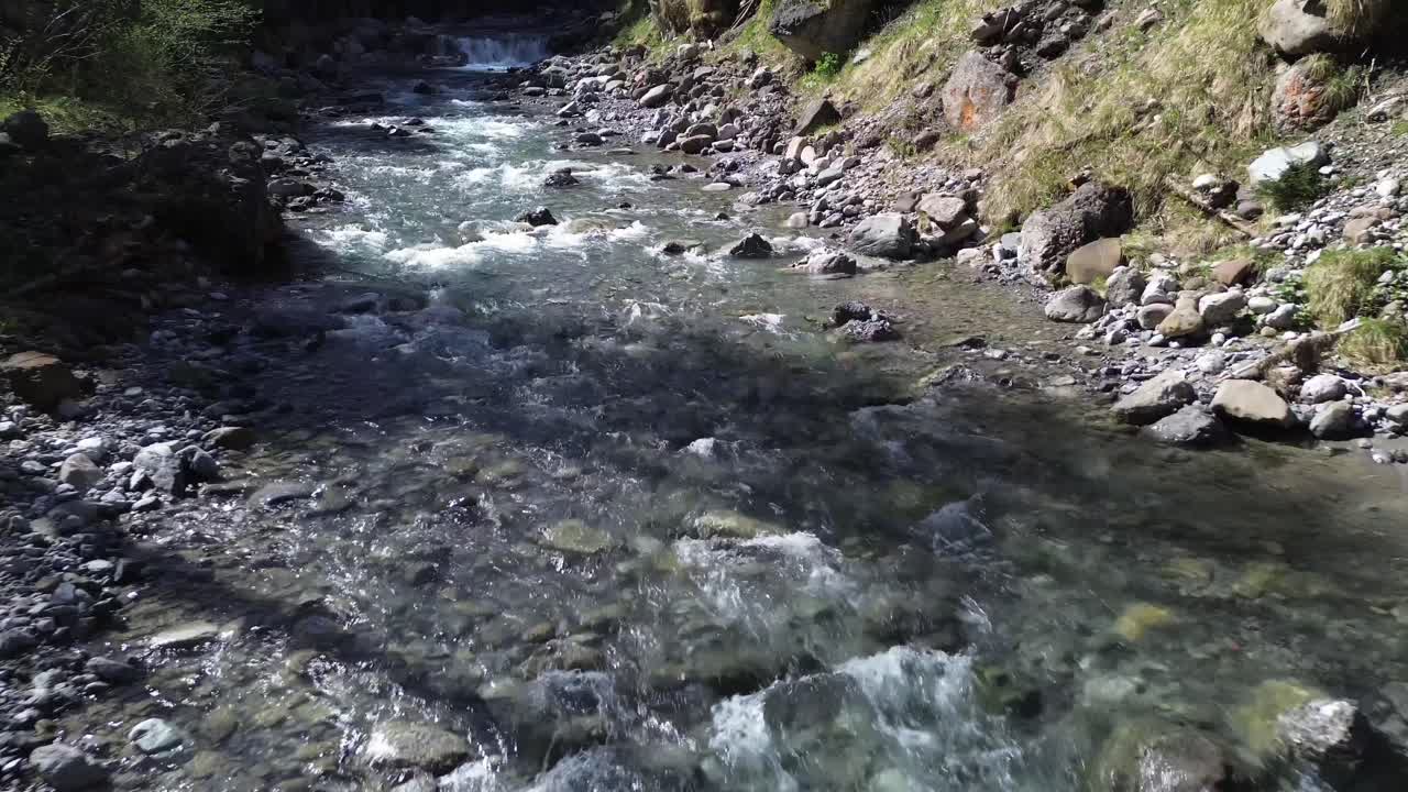 Top view of Drone Fly towards Mountain River in Austrian Nature