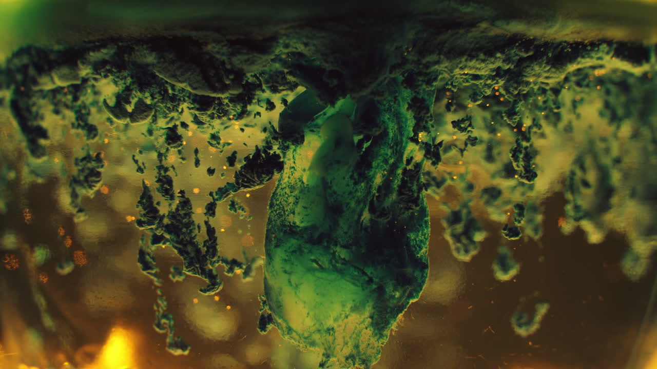 Abstract Green Mold Formation in a Liquid