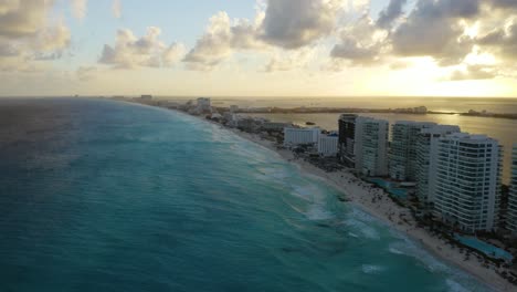 drone descends over gulf of mexico, beautiful sunset in paradise