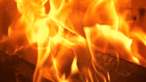 Slow-motion-of-burning-fire-in-cozy-fireplace,-Close-up-shot