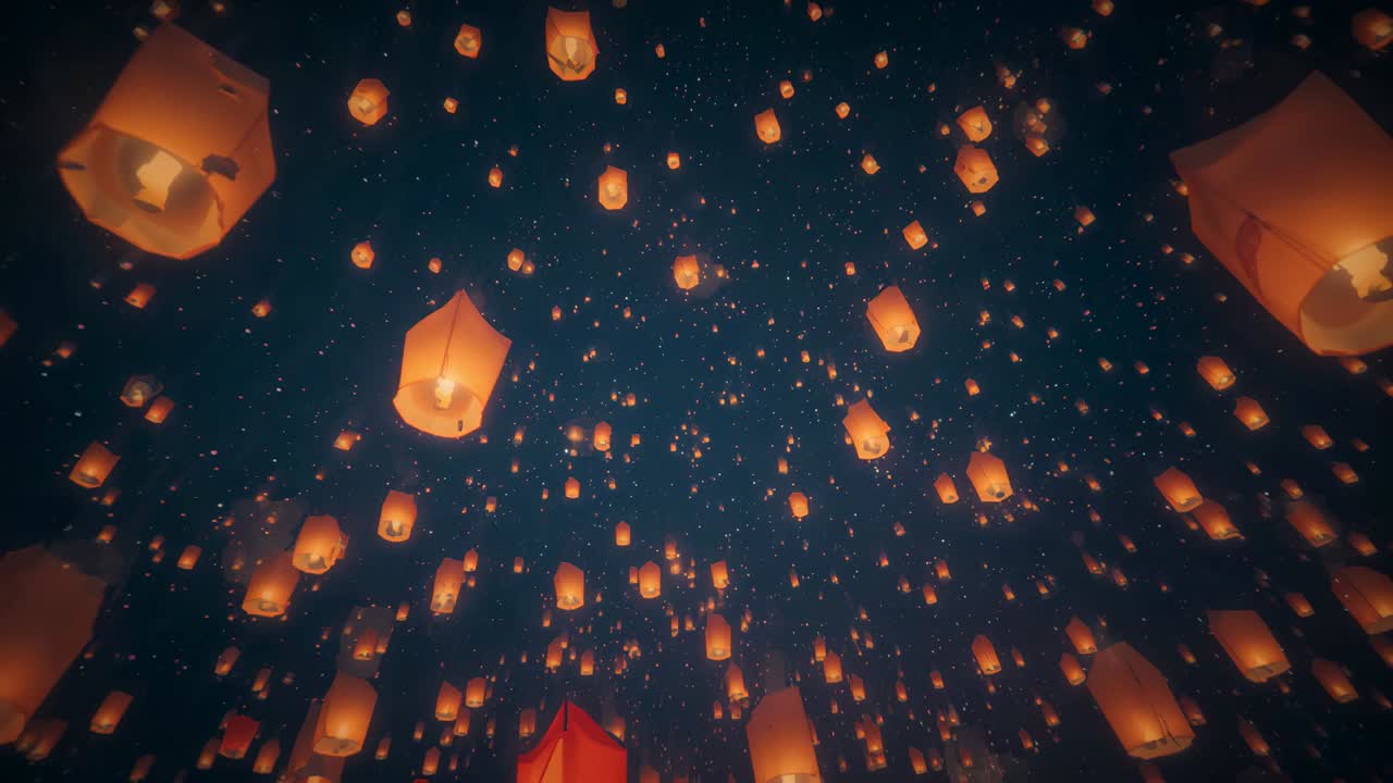 Des lanternes célestes en papier incandescent s’élèvent dans le ciel nocturne après le lancement du festival, marquant la célébration
