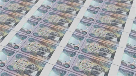 5000 iraqi dinar banknotes printed by a money press