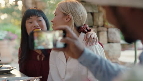 two-funny-woman-eating-oranges-posing-for-photo-making-faces-having-fun-with-friends-laughing-enjoying-summer-reunion-outdoors-happy-tourist-people-on-vacation-4k