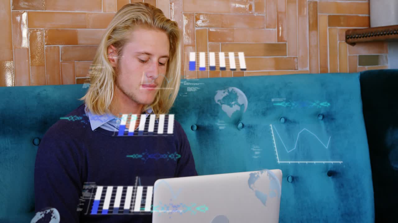 Animation of graphs, globes and computer language, caucasian man working on laptop