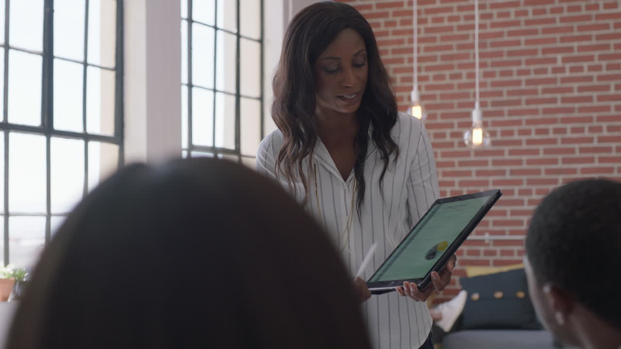happy business people meeting celebrating success african american team leader woman dancing funny enjoying celebration colleagues high five sharing successful corporate victory in office presentation
