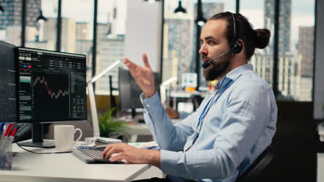financial advisor in office offers investment guidance during call with client