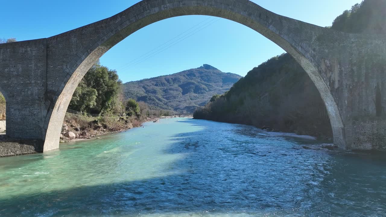Flying below a traditional arch bridge in Epirus province, Greece
