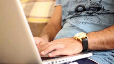 Young-Male-Freelancer-Working-From-Home-Via-Laptop-CloseUp-Of-Male-Hands-Typing-On-Computer