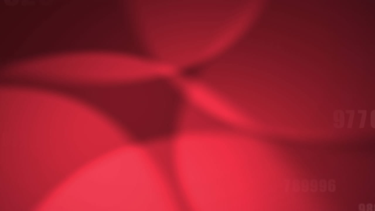 검은색 배경에 있는 빨간색 빛의 반점에 대해 여러 개의 숫자가 바뀌고 있습니다.