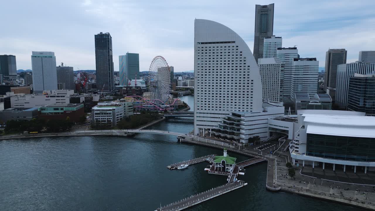 Drone rises above Yokohama skyline showing Asia future economy and trade hub
