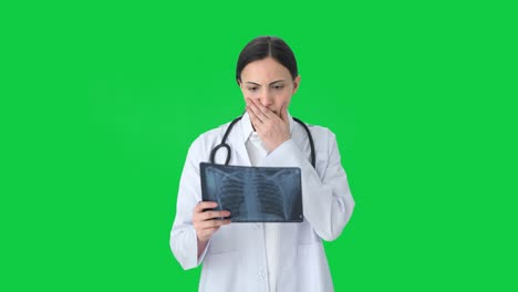 Indian-female-doctor-getting-shocked-after-seeing-X-ray-Green-screen