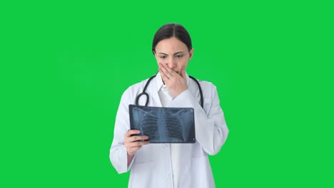 indian female doctor getting shocked after seeing x ray green screen
