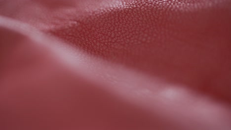 closeup of raw leather fabric in a manufacturing factory, material for fashion production