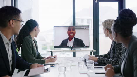 Colleagues-meeting-boss-via-video-call-during