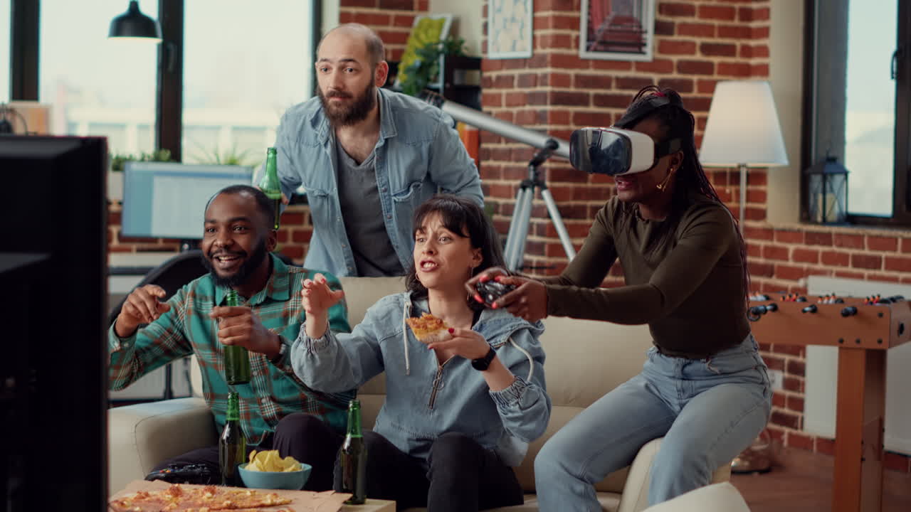 Multiethnic group of people celebrating video games win