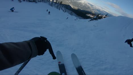 pov shot of good skier on slopes in whistler, canada